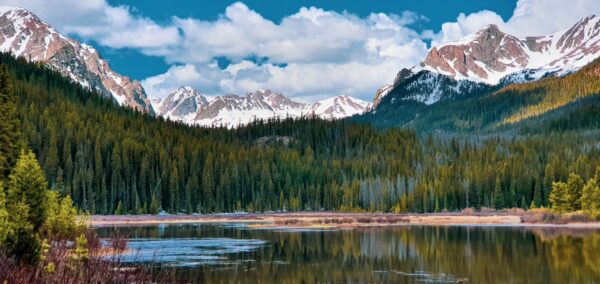 Beautiful mountain landscape with a lake and forest in the Rockies.